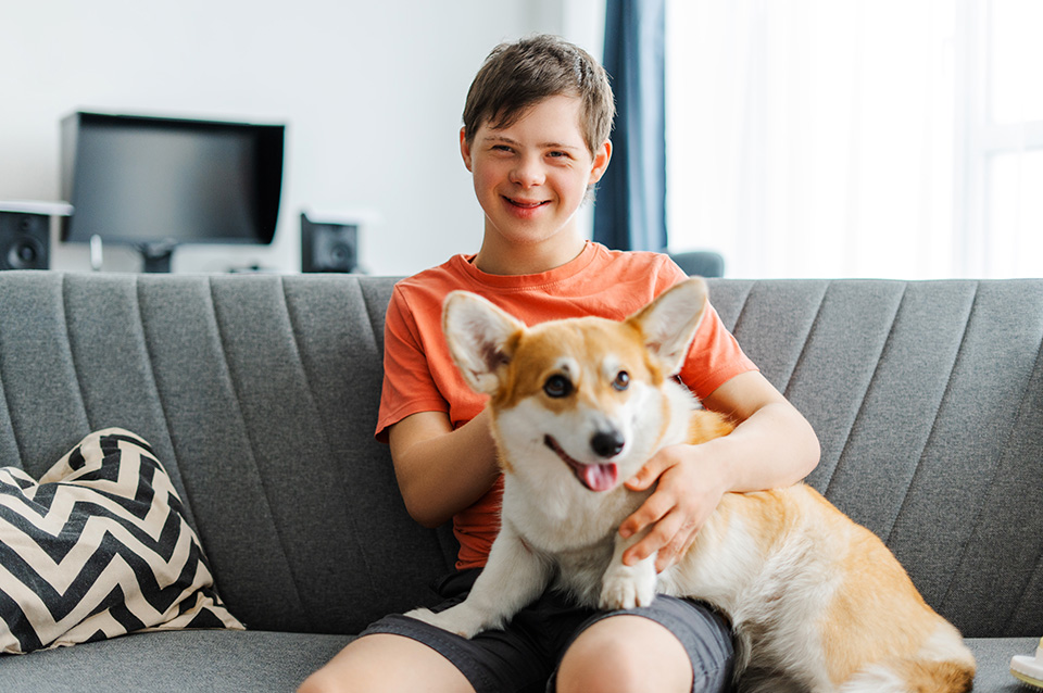 Caregiver assisting a person with a disability at home